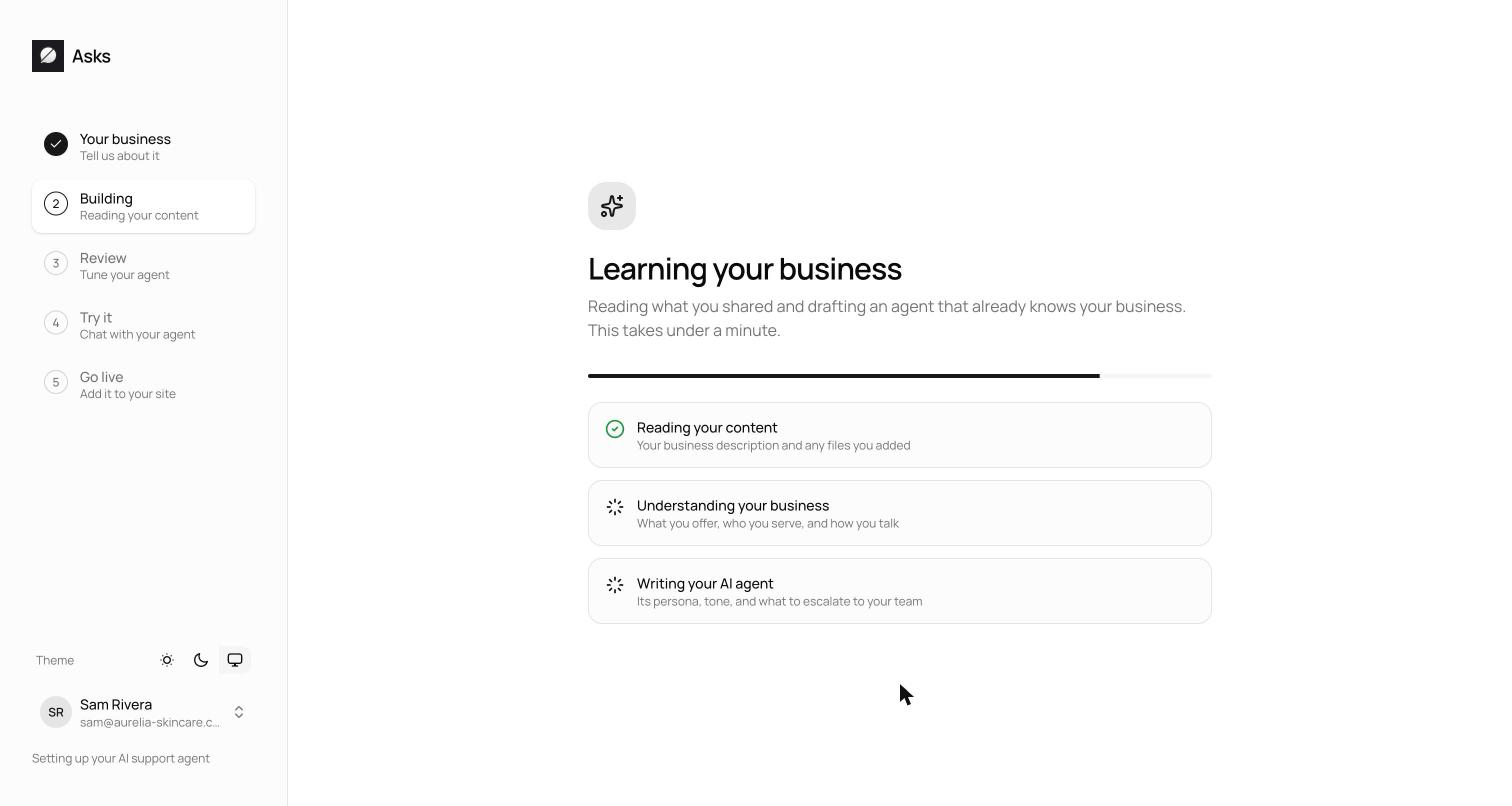 Onboarding building step showing the progress bar and three phases: reading your website, learning your brand and catalog, and writing your AI agent